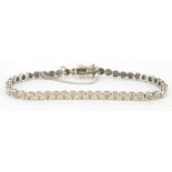 18ct white gold diamond bracelet, 16cm in length, approximate weight 11.0g : For extra condition