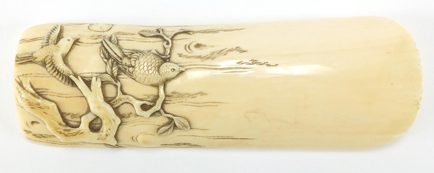 Japanese ivory wrist rest, finely carved with birds of Paradise, together with a bronze and mixed - Image 2 of 6