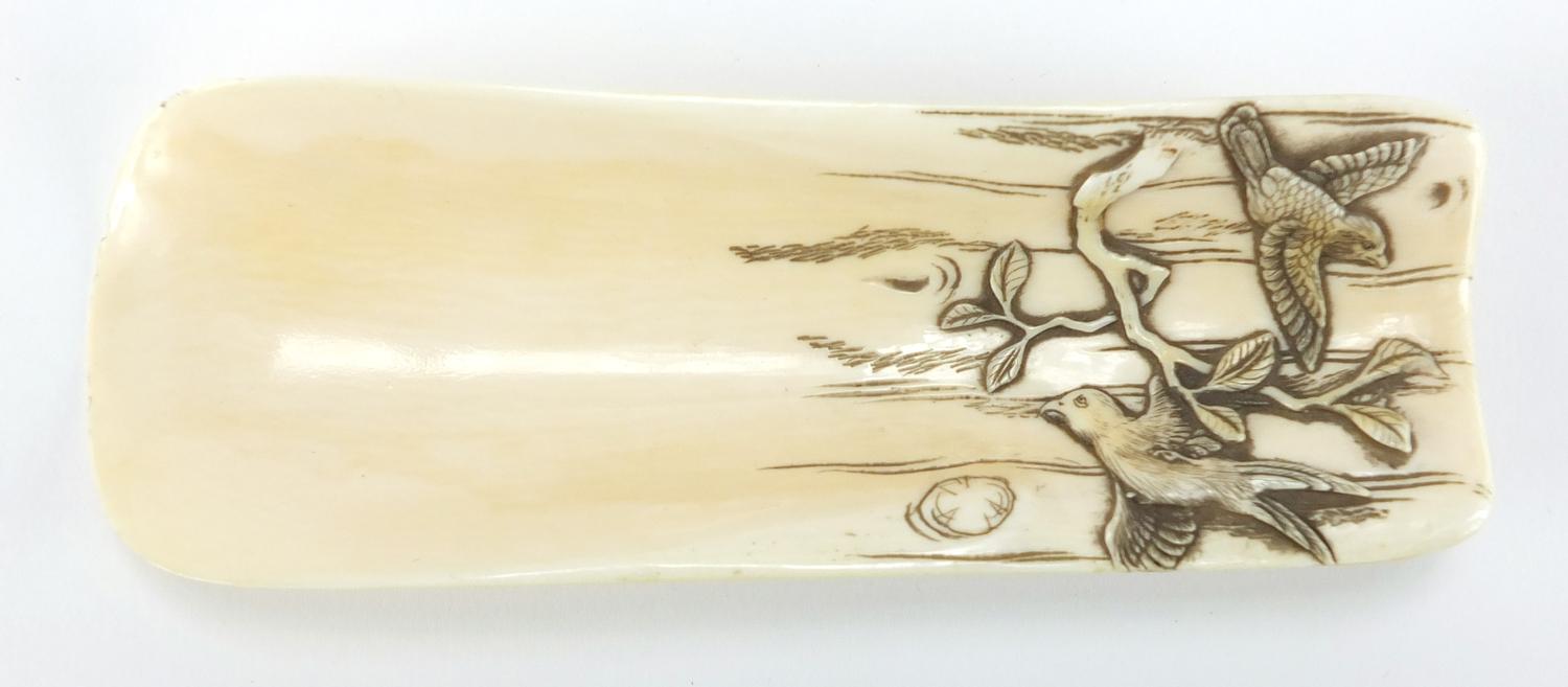 Japanese ivory wrist rest, finely carved with birds of Paradise, together with a bronze and mixed - Image 3 of 6