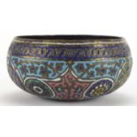 Islamic copper bowl, enamelled with flowers amongst foliate motifs, 11cm in diameter : For Further