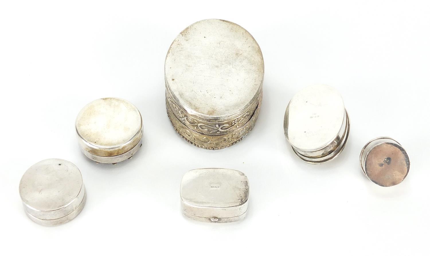 Five silver pill boxes and an Oriental silvered metal trinket, with porcelain panel, the largest 6cm - Image 4 of 5