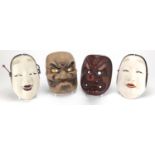 Four Japanese masks including two Ko-omote and a red lacquered iron Tengu mask, one with box, the