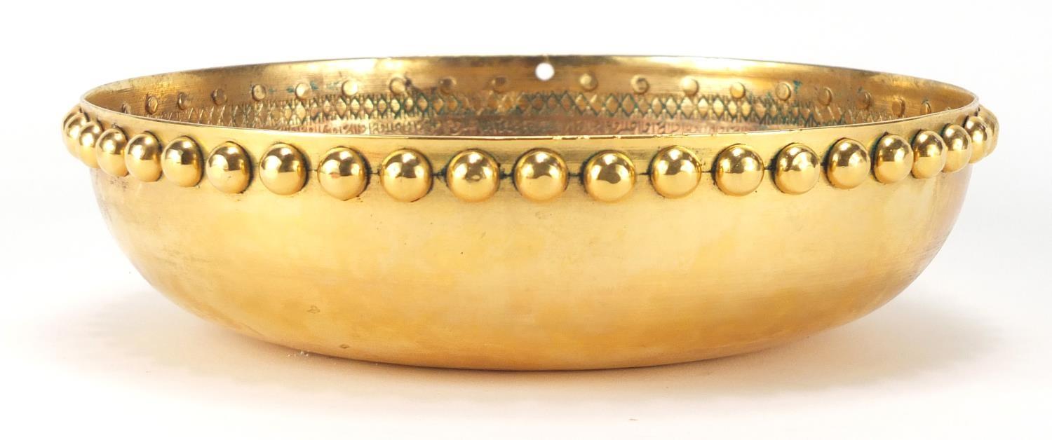 Ottoman gilt copper Hammam bowl with central flower head motif, profusely engraved with calligraphy, - Image 2 of 5