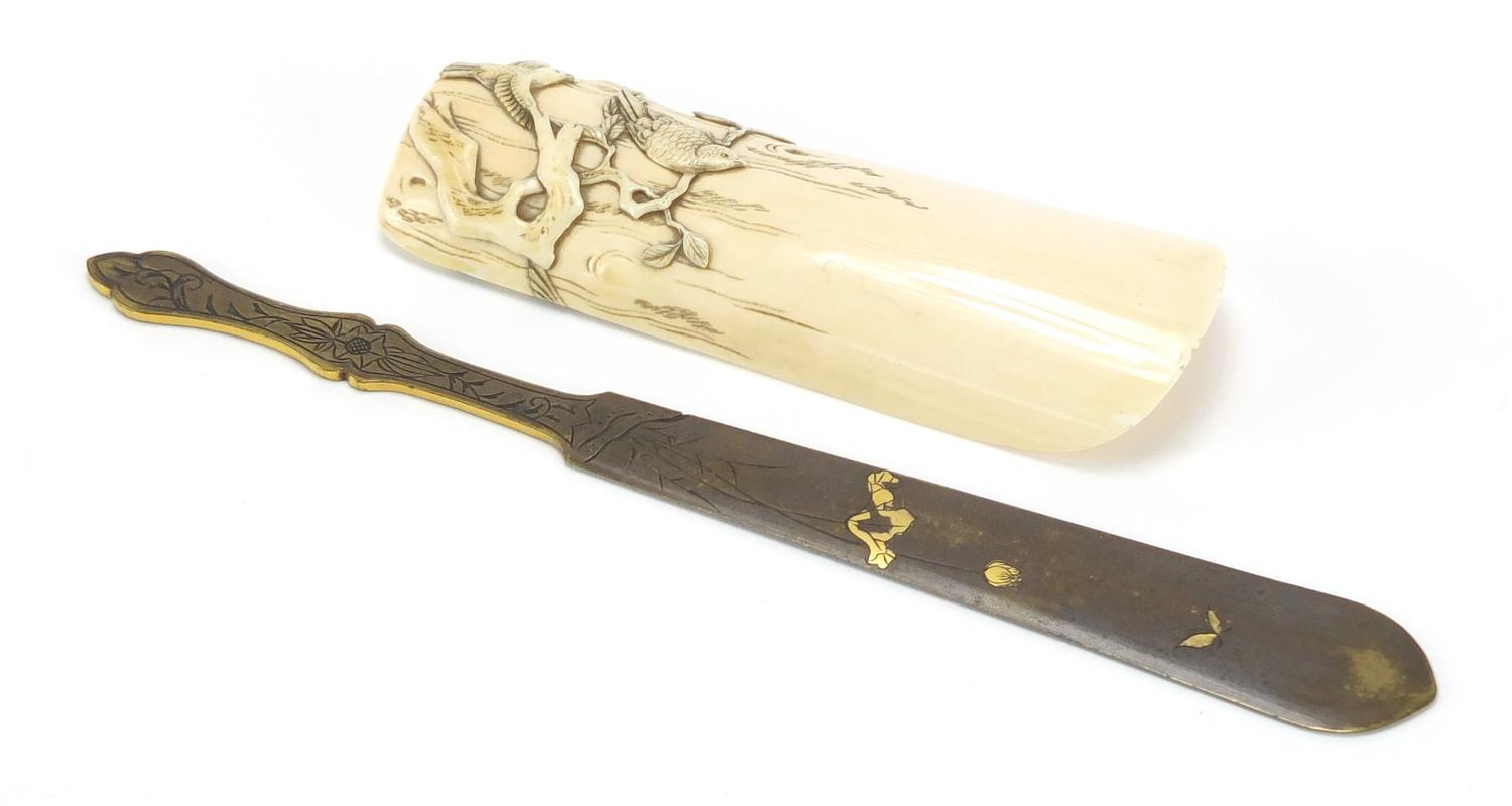 Japanese ivory wrist rest, finely carved with birds of Paradise, together with a bronze and mixed