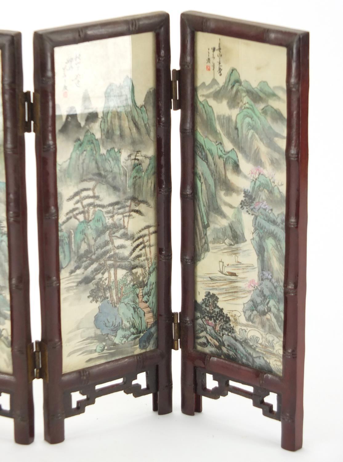 Oriental four fold screen, each panel hand painted with birds of Paradise and a river landscape, - Image 3 of 4