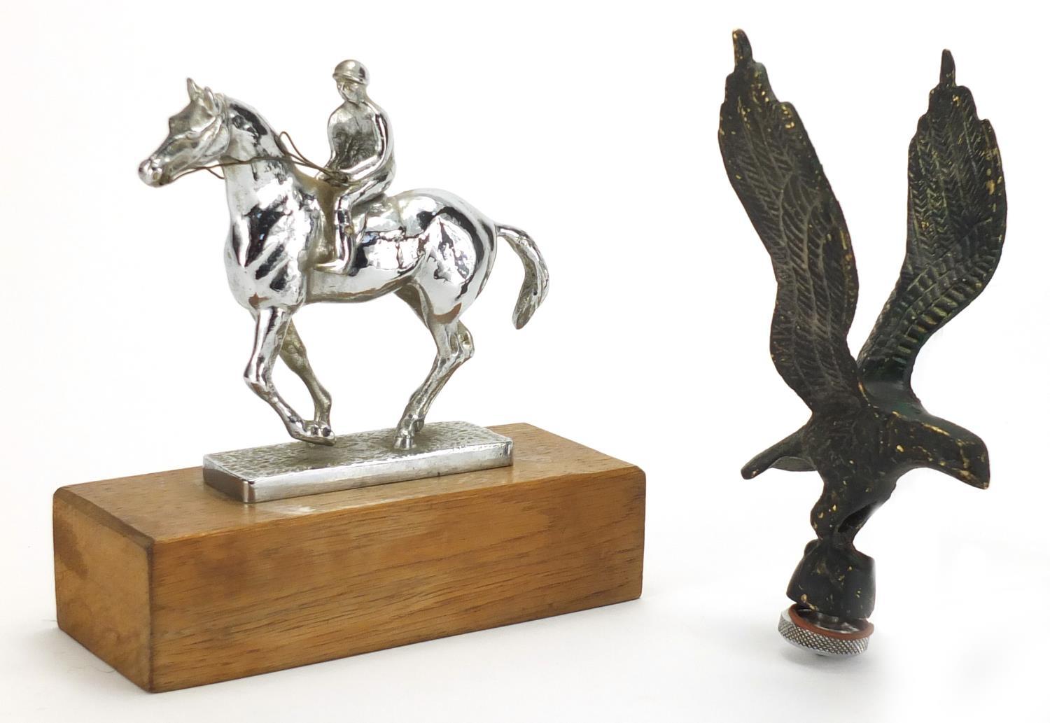 Two vintage car mascots including a chrome jockey on horseback example, the largest 17cm high :