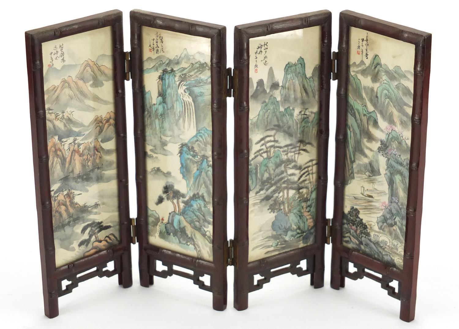 Oriental four fold screen, each panel hand painted with birds of Paradise and a river landscape,