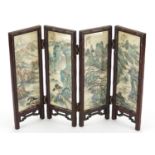 Oriental four fold screen, each panel hand painted with birds of Paradise and a river landscape,