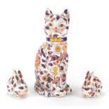 Japanese Imari cat and pair of rabbits, character marks to the bases, the largest 35cm high : For