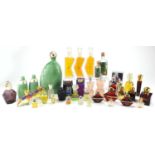 Collection of mostly shop facet dummy perfume bottles, some empty including Givenchy, John Paul