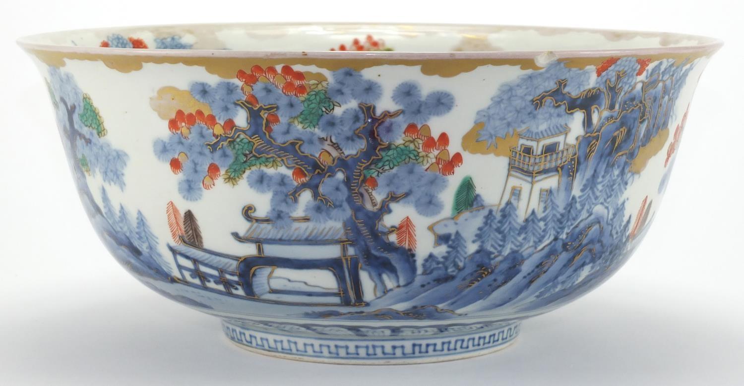 Japanese porcelain bowl, hand painted to the exterior and interior with a traditional continuous