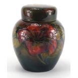 Moorcroft pottery Flambe ginger jar and cover, hand painted and tube lined with flowers, paper label