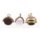 Three 9ct gold spinner fobs set with hardstones and crystal, the largest 2.5cm high, approximate