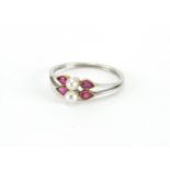 Unmarked white metal pearl and ruby ring, size O, approximate weight 2.1g : For Further Condition