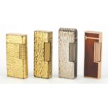 Four Dunhill pocket lighters comprising two enamel and two gold plated examples : For Further
