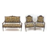 19th century French carved walnut salon suite comprising a two seater settee and two armchairs