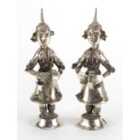 Pair of Middle Eastern unmarked silver musicians, one with paper labelto the base, the largest