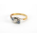 18ct gold diamond and sapphire crossover ring, size M, approximate weight 3.0g, housed in a Nelson