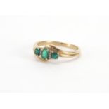 9ct gold emerald and diamond crossover ring, size R, approximate weight 2.9g : For Further Condition