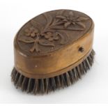 Novelty Black Forest musical brush carved with flowers, 10.5cm wide :For Further Condition Reports