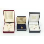 Three 9ct gold pendants on 9ct gold necklaces, one with matching earrings, approximate weight 3.0g :