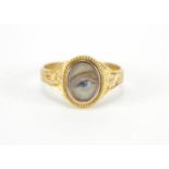 Antique 9ct gold lovers eye ring, the ivory panel hand painted with an eye, indistinct Chester
