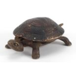 Novelty clockwork tortoise table bell, numbered 7 4300 to the underside, 17cm in length :For Further