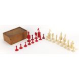 Part 19th century half stained carved bone chess set, the largest piece 10cm high :For Further