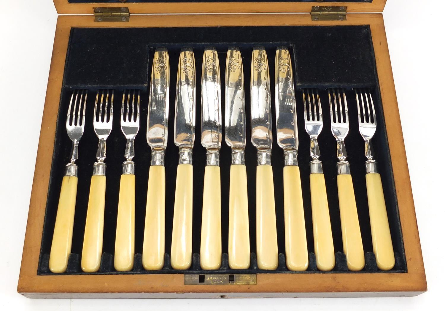 Mahogany six place canteen of silver plated fish knives and forks, with ivory handles and silver - Image 3 of 5