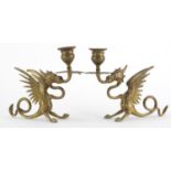 Pair of brass Griffin design candlesticks, each 20cm in length : For Further Condition Reports