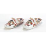 Pair of Meissen porcelain slippers, each hand painted and gilded with flowers, cross sword marks