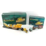 Two Corgi die cast Heavy Haulers with boxes, scale 1:50, International Transtar with crushed carload