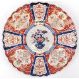 Japanese Imari porcelain charger, hand painted with panels of flowers, 46.5cm in diameter :For