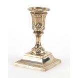 Square based silver candlestick with embossed decoration, by Samuel Smith, Sheffield 13cm high,