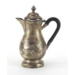 Victorian silver sparrow beak jug with hinged lid and ebonised wood handle, by Matthew John