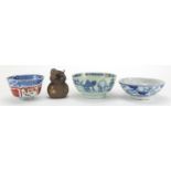 Oriental ceramics including a Yixing terracotta jug enamelled with butterflies and a blue and