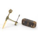 Early 19th century brass botanical microscope with ivory handle and case, 10cm in length (when open)