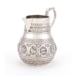 Victorian silver sparrow beak jug, embossed with zodiac symbols, by Charles Stuart Harris, London