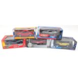 Five die cast vehicles with boxes, scale 1:18, including James Bond 007 Anniversary Aston Martin V12