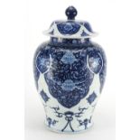 Large Chinese blue and white porcelain baluster jar and cover, hand painted with flowers and