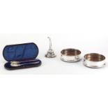 Silver plated items comprising pair of oak wine coasters, wine funnel and pair of Victorian berry
