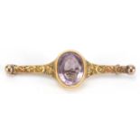 Victorian gold and amethyst bar brooch, hallmarked Birmingham 1944, 6.5cm in length, approximate