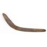 Australian carved wooden boomerang, incised with floral motifs, 48.5cm in length :For Further