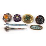 Antique and later brooches including two Scottish set with hard stones, agate and silver and enamel,