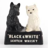 Vintage black and white Scotch whisky pottery advertising group of two terriers, impressed made in
