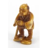 Japanese carved ivory Netsuke of a fisherman, character marks to the base, 4.5cm high :For Further