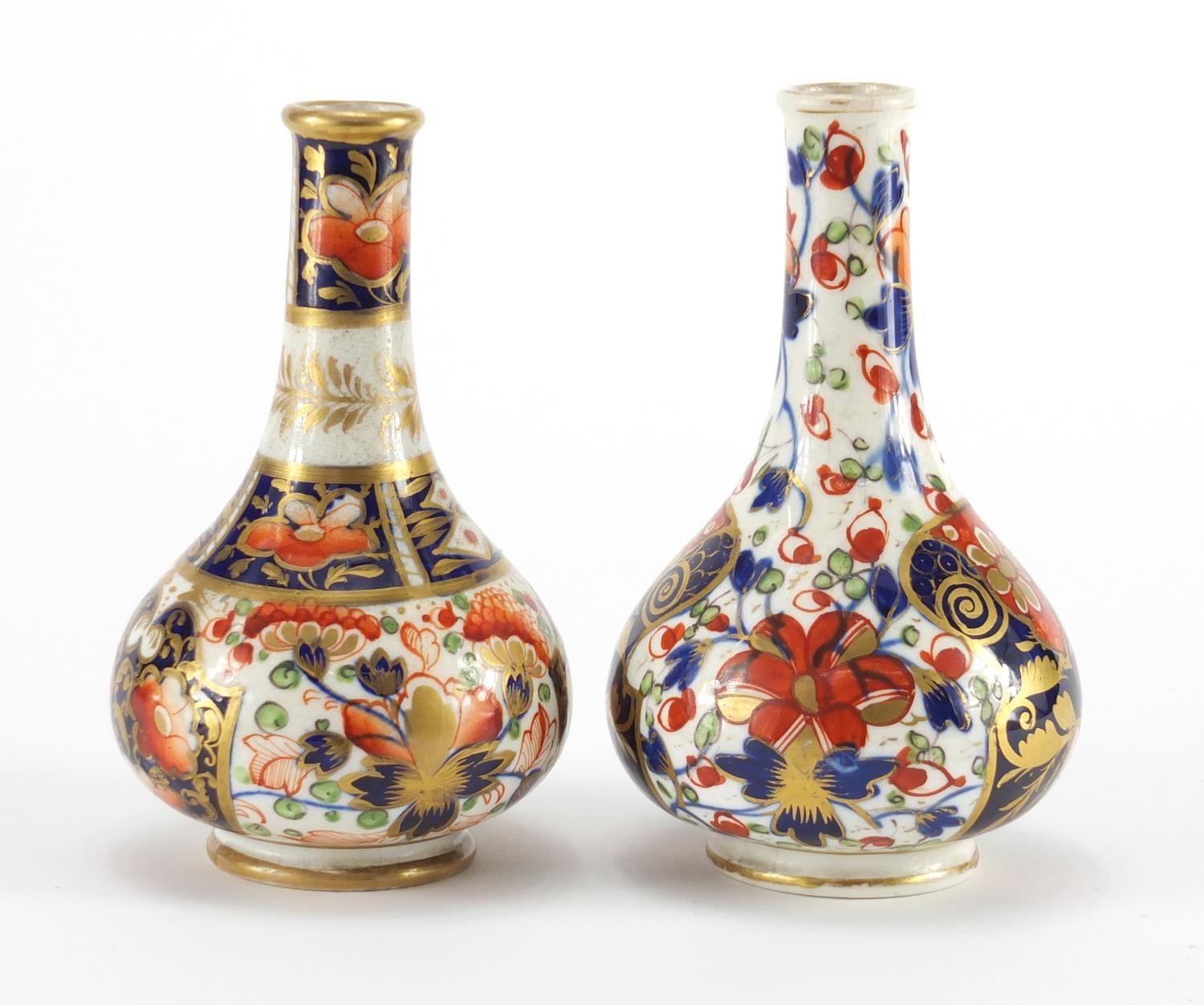 Two 19th century Derby porcelain bottle vases, hand painted and gilded in the Imari palette, painted - Image 4 of 7