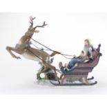 Large Lladro figure group, Winter Wonderland with figures in a reindeer sledge, numbered 1429,