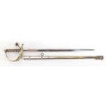Military interest sword design letter opener with scabbard and engraved brass basket, 25cm in length