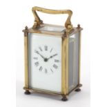French brass cased carriage clock with enamelled dial and Roman numerals, 11cm high :For Further